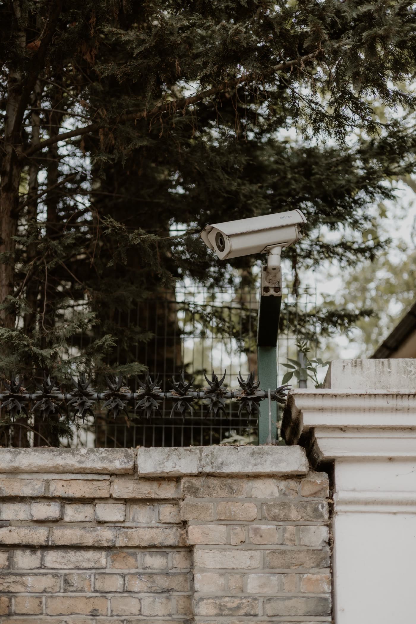 A security camera mounted on a home